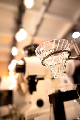 a close up of a glass object on a table at WiRE BANGKOK PRAKHANONG in Amphoe Phra Khanong