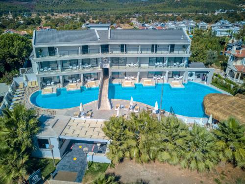 an aerial view of a resort with a swimming pool at Orka World Hotel & Aquapark in Oludeniz