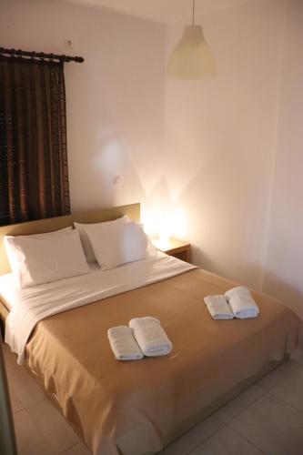 Postel nebo postele na pokoji v ubytování Apartments Piazza