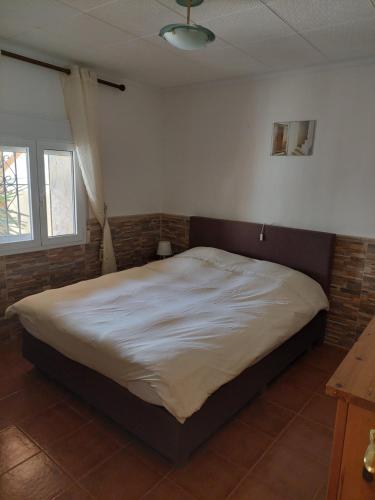 Säng eller sängar i ett rum på Casa Rural Mas Solana