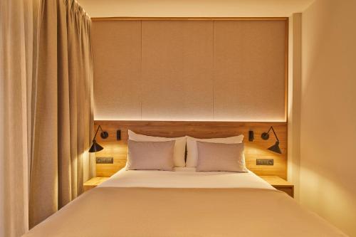 Katil atau katil-katil dalam bilik di Hotel MIM Baqueira Luxury & SPA