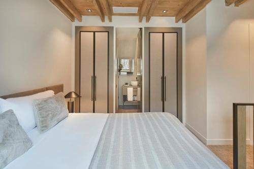 Katil atau katil-katil dalam bilik di Hotel MIM Baqueira Luxury & SPA