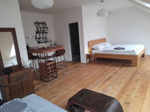 Postel nebo postele na pokoji v ubytování RV apartmán Mikulov