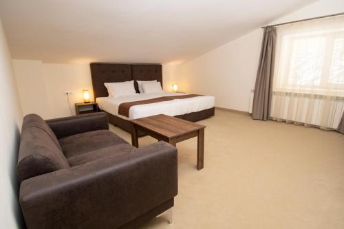Кровать или кровати в номере Hotel Malyovitsa