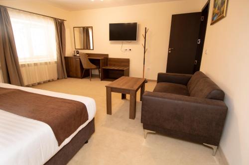Телевизор и/или развлекательный центр в Hotel Malyovitsa
