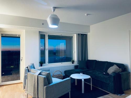 Χώρος καθιστικού στο STAY Matinkylä Apartments