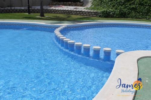 Het zwembad bij of vlak bij Luxury Quad House Playa Golf R6 with Com Pool P241