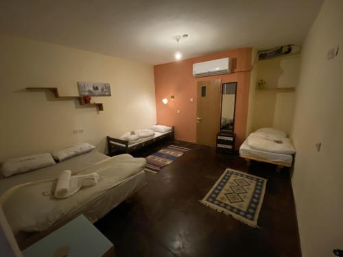 Una cama o camas en una habitación de Spice Quarter Inn