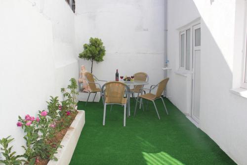 Patio atau area outdoor lain di Reydel Hotel