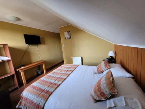 Postel nebo postele na pokoji v ubytování Hotel San Giorgio