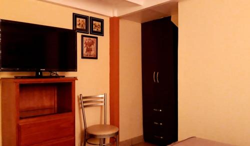TV a/nebo společenská místnost v ubytování Kanata Properties 2