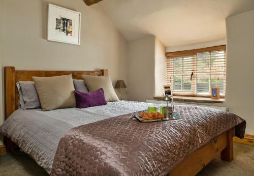 מיטה או מיטות בחדר ב-Finest Retreats - Wye Head Cottage