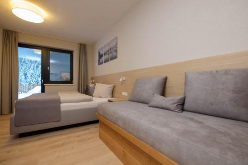 Ein Bett oder Betten in einem Zimmer der Unterkunft Arrivar