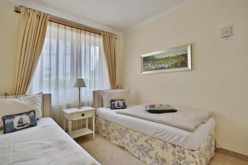 Giường trong phòng chung tại Villa Seestern Villa Seestern Appartement 3