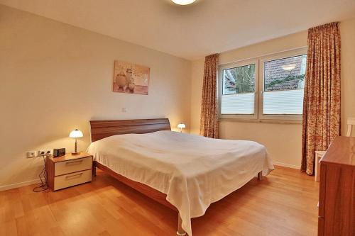 Postel nebo postele na pokoji v ubytování Villa Mér Baltique Villa Mér Baltique Appartement 20