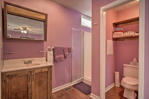 a bathroom with a sink and a shower and a toilet at Inviting Apartment with Deck in Smoky Mountains in Newport