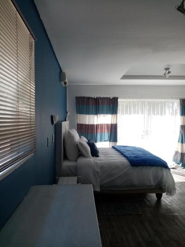 Ένα ή περισσότερα κρεβάτια σε δωμάτιο στο Lior-Gil accommodation-