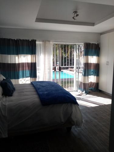 Ένα ή περισσότερα κρεβάτια σε δωμάτιο στο Lior-Gil accommodation-