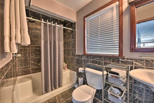 A bathroom at Pet-Friendly Retreat with Deck Steps to Marina!