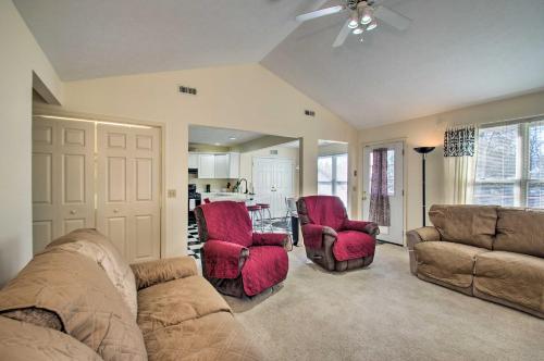 a living room with a couch and two chairs at Central Harrisonburg Home with Fenced-In Yard! in Harrisonburg