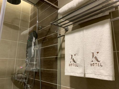 Koupelna v ubytování K Hotel
