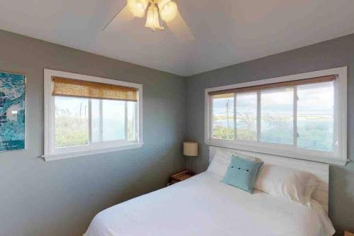 Łóżko lub łóżka w pokoju w obiekcie Ruby - Ocean view with privacy