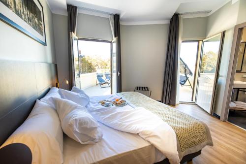 Ένα ή περισσότερα κρεβάτια σε δωμάτιο στο The Cross Hotel