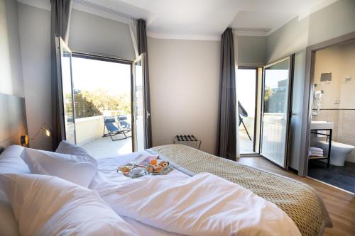 Ένα ή περισσότερα κρεβάτια σε δωμάτιο στο The Cross Hotel