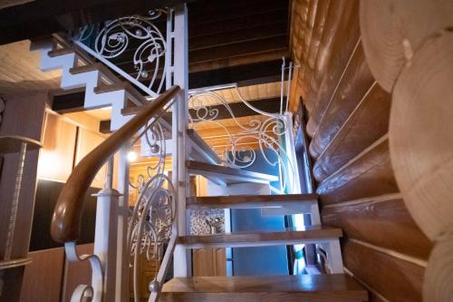a stairway with a railing and a stair case at Green Zone in Migovo