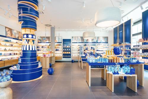 a store filled with blue vases on display at aja Garmisch-Partenkirchen in Garmisch-Partenkirchen
