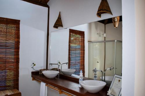 Kylpyhuone majoituspaikassa Barra Suítes