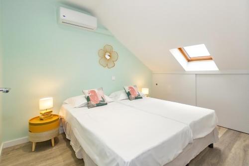 Katil atau katil-katil dalam bilik di Cap Noir - magnifique vue mer - St Gilles centre
