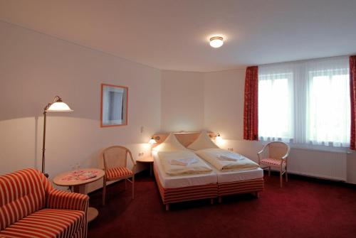 Una habitación en Hotel Weidenmühle