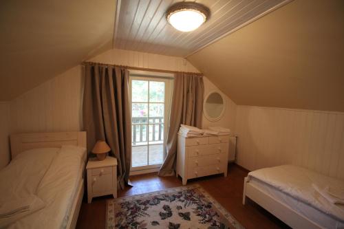 Postel nebo postele na pokoji v ubytování Villa Dirhami