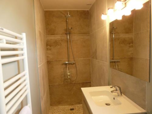 a bathroom with a shower and a sink at Gîte Les-Villages-Vovéens, 5 pièces, 12 personnes - FR-1-581-63 