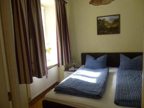 Krevet ili kreveti u jedinici u objektu Ferienappartement Königliche Villa Berchtesgaden