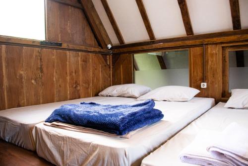 Säng eller sängar i ett rum på Samami Garden