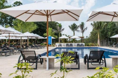 Foto dalla galleria di Resort&House,4 Quartos, 8 pessoas, Beach tenis, Bike, Golfe, Pesca, Ar, Wifi fibra, TV a cabo e Lareira a Águas de Santa Barbara