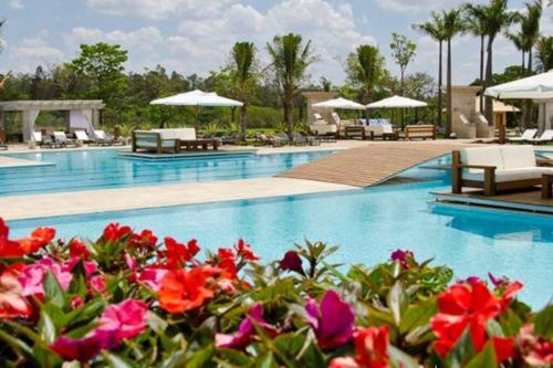 Foto dalla galleria di Resort&House,4 Quartos, 8 pessoas, Beach tenis, Bike, Golfe, Pesca, Ar, Wifi fibra, TV a cabo e Lareira a Águas de Santa Barbara