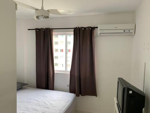 Postel nebo postele na pokoji v ubytování Apart Home Águas de Porto Belo