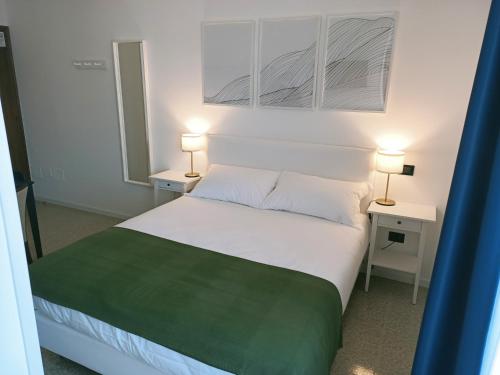 Postel nebo postele na pokoji v ubytování Casa Valcellina Hotel Ristorante