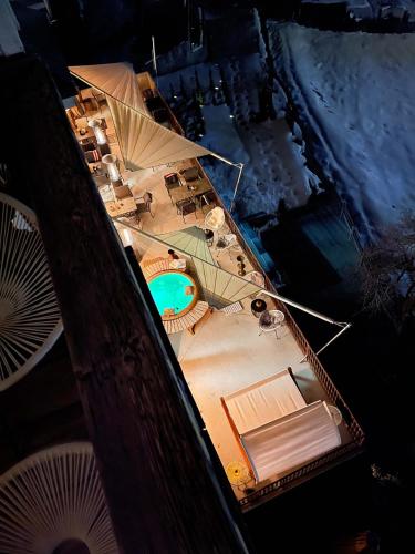 an overhead view of a resort with a swimming pool at DU GLACIER Boutique & Traditions Hotel in Fiesch