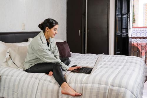 Postel nebo postele na pokoji v ubytování Hotel Central Teziutlan