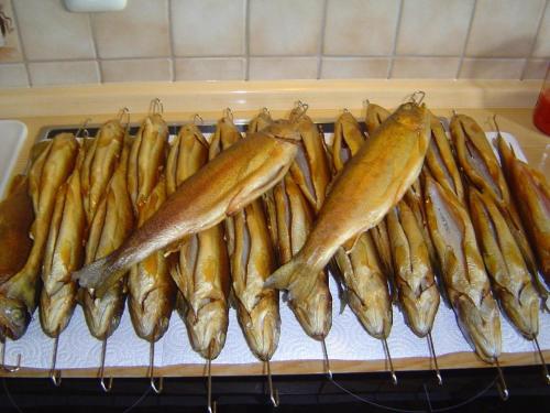 a bunch of fish are lined up on a grill at Ferienwohnung-im-Haus-Christine in Riedlhütte