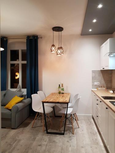 Kuchyňa alebo kuchynka v ubytovaní Apartament Przy Placu Piastowskim
