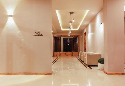 a hallway of a building with a door and a hallwayngth at The Bodhi Tree in Leh