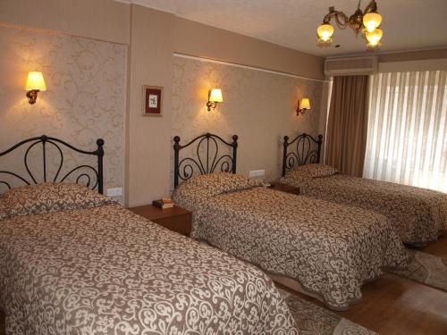 Postelja oz. postelje v sobi nastanitve Hotel Nezih Istanbul