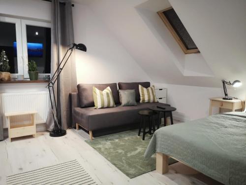 Postel nebo postele na pokoji v ubytování Apartament Wrzosowa 25