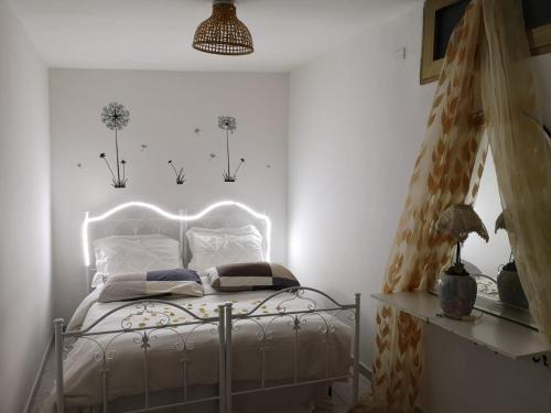 Кровать или кровати в номере villa mina con vasca idromassaggio