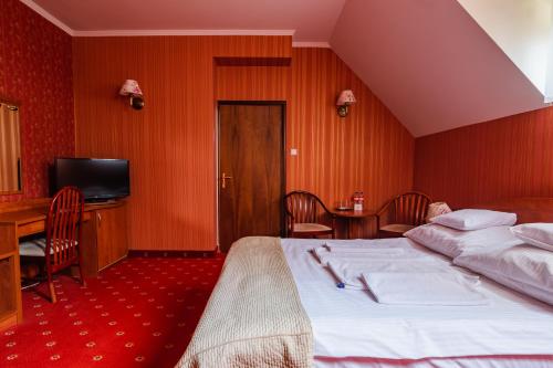 Ліжко або ліжка в номері Hotel Restauracja Browar Lwów w Lublinie